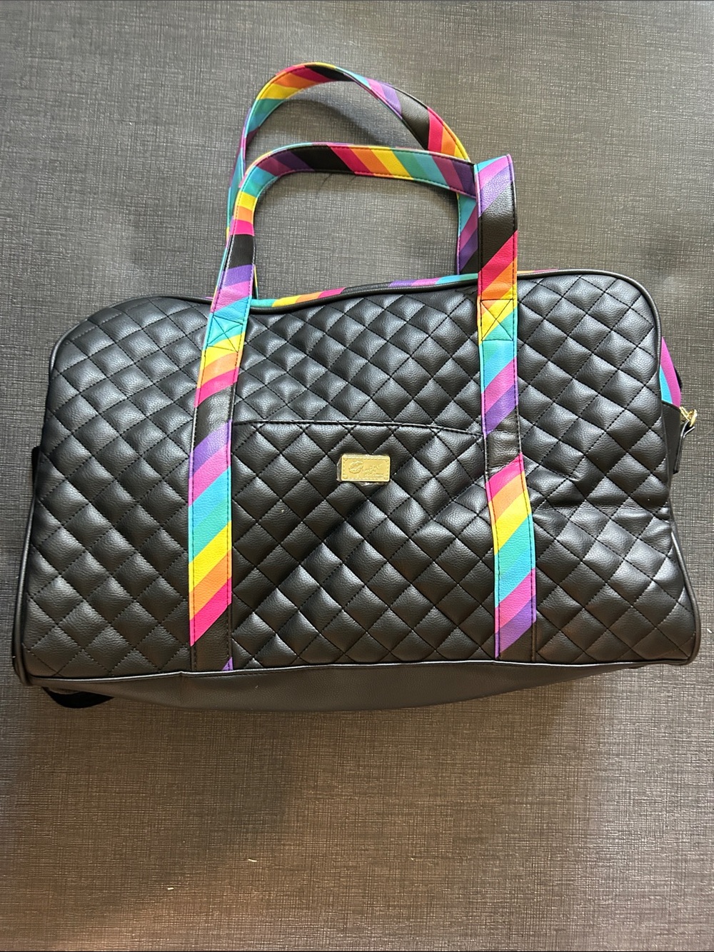 Luv Betsey rainbow & black duffle bag with luggage slide through